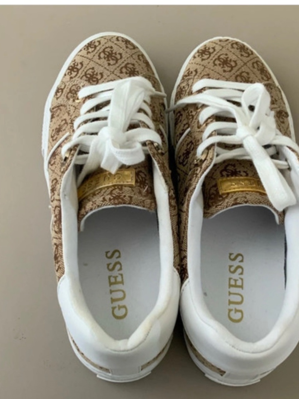Guess tan, cream, gold logo sneakers. Size 8.5 medium. Never worn.